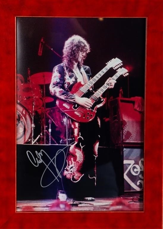 JIMMY PAGE SIGNED STAGE PHOTO FRAMED W/ COA: Led Zeppelin' guitarist Jimmy Page signed stage photo framed 10.00" X 14.00" w/ COA. Size: 10.00" X 14.00" Condition: Little to no wear, see images for details.