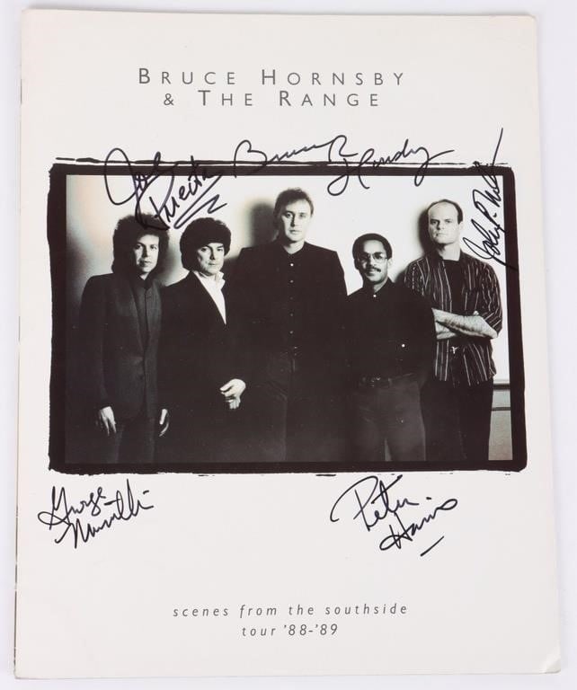 AUTOGRAPHED BRUCE HORNSBY & RANGE TOUR BOOK '88-89: Bruce Hornsby & the Range book for the '88-'89 Southside tour, autographed by the entire band (Bruce Hornsby, David Mansfield, George Mansfield, George Marinelli, Joe Puerta, and John Molo). Size: 14