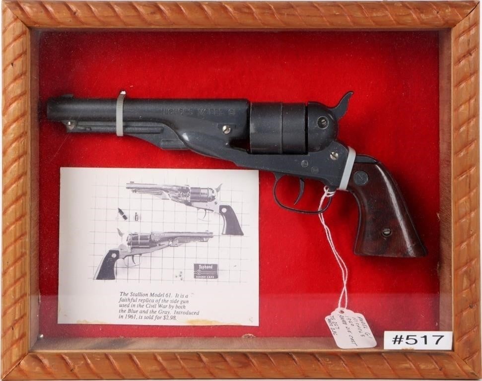 NICHOLS STALLION MODEL 61 RARE CIVIL WAR REPLICA: Nichols Stallion Model 61. Faithful & rare die cast replica of the side gun used in the Civil War by both the blue and gray. Revolver is suspended in special display box. Introduced in 1961, sold for 