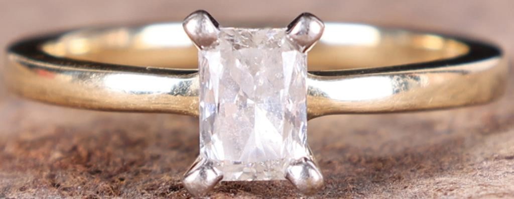 14K YELLOW GOLD NATURAL RADIANT DIAMOND RING: 14K yellow gold natural radiant cut diamond ladies ring. Gemstones to include one 0.20ct radiant cut natural diamond. Diamond tested natural via Gemlogis Ultraviolet fluorescence. Stone Type: Diamond 