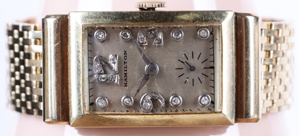 HAMILTON 14K YELLOW GOLD DIAMOND LADIES WRISTWATCH: Vintage Hamilton 14K yellow gold diamond ladies wristwatch. This watch is nearly entirely 14K yellow gold except for the movement, the dial, and the crystal. Gemstones to include nine 0.02ct round cut
