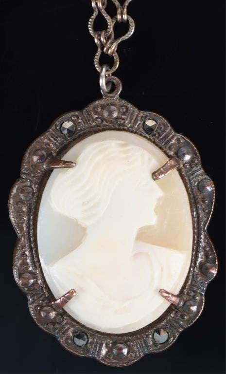 ANTIQUE 10K YELLOW GOLD LADIES CAMEO NECKLACE: Antique 10K yellow gold ladies necklace with a cameo pendant which depicts the side profile of a woman surrounded by small marcasite stones. The piece is intentionally weathered. Stone Type: Marcasite