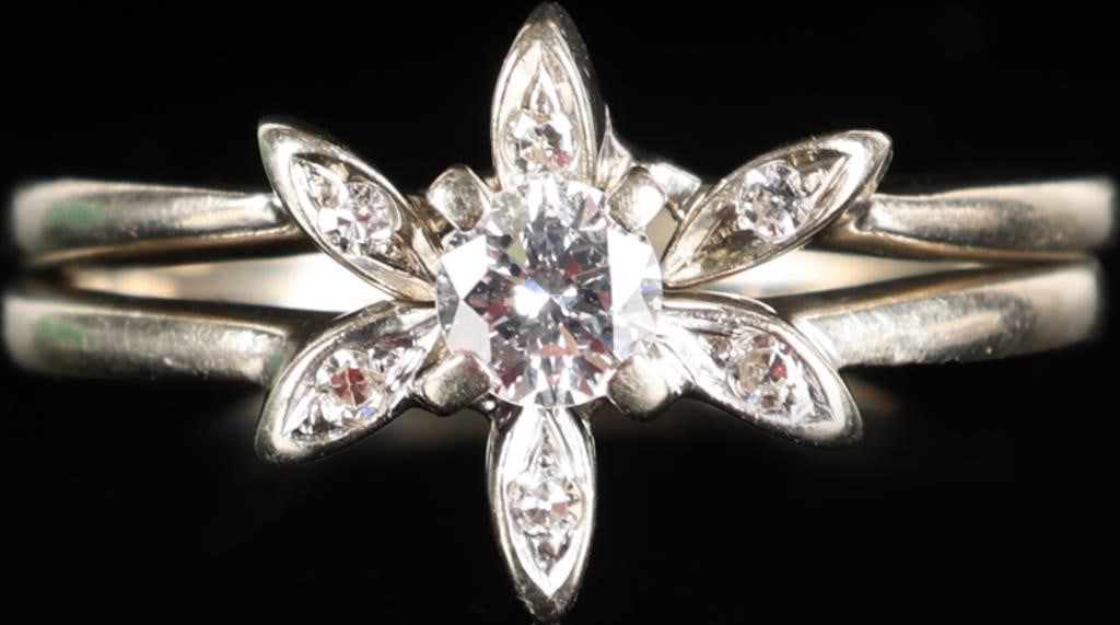 14K WHITE GOLD ENGAGEMENT RING SET W/ DIAMONDS: Set of two 14k white gold engagement rings. one features an arc of three oval-shaped settings which each feature a 0.01ct round-cut diamond. The other features the same pattern and diamonds except wit