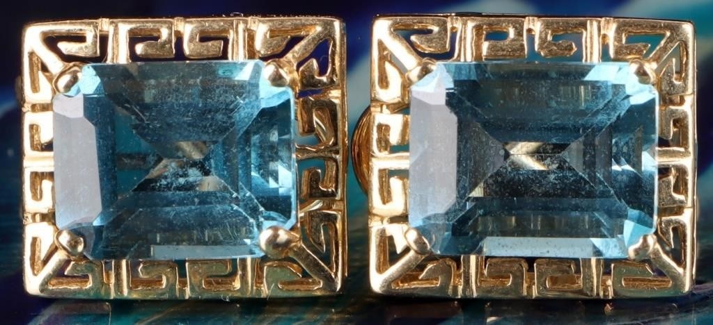 14K YELLOW GOLD TOPAZ GREEK KEY LADIES EARRINGS: 14K yellow gold blue topaz Greek Key design ladies earrings. Gemstones to include one 2.00ct emerald cut blue topaz.. Stone Type: Topaz Weight: 4.83 Grams Size: 0.50" Condition: Little to no wear, see