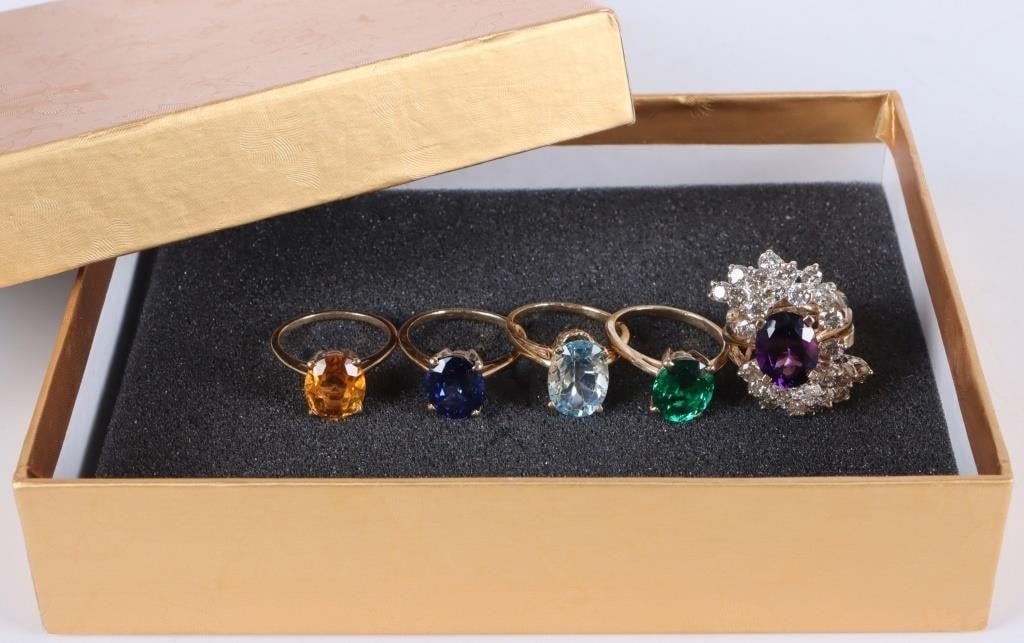INTERCHANGEABLE YELLOW GOLD 5 RING ~22CT STONE SET: 10/14K yellow gold interchangeable 5 ring ~22ct total stone set to include one 3.00ct oval faceted tsavorite 10K ring insert, one 3.00ct oval faceted citrine 10K ring insert, one 3.00ct oval faceted i