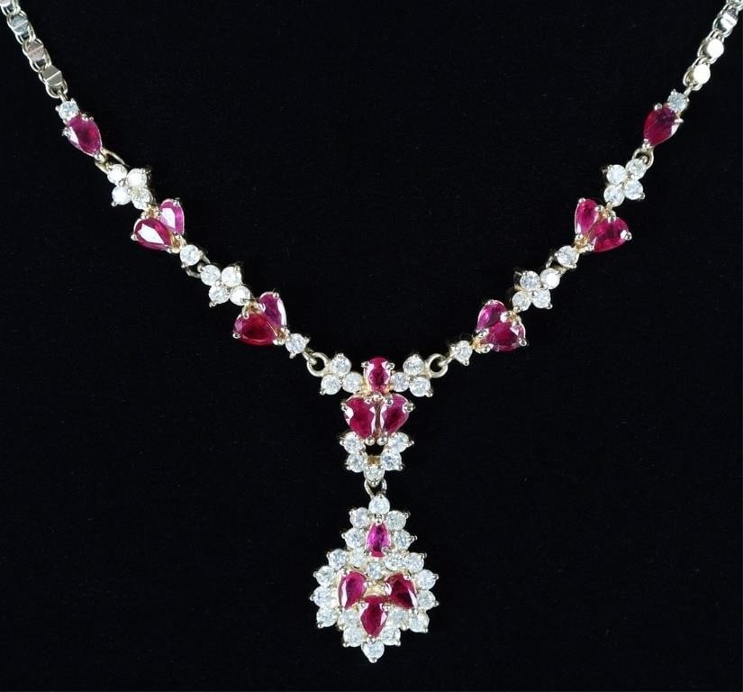 EXQUISITE 3.5CTW DIAS 5.6CTW RUBY 14K NECKLACE: Brilliant 14k yellow gold ladies necklace. The piece is from Oceanside Estate Jewelry and features a written and video appraisal, the latter of which is contained on a DVD. The piece includes, in the 