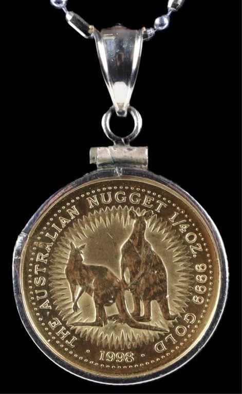 14K YELLOW GOLD NECKLACE W/ AUSTRALIAN $25 COIN: 14k gold ladies necklace. The chain is an alternating pattern of oblong yellow gold beads and spherical white gold beads. The pendant features an Australian $25 coin, which is 1/4 oz of .9999 gold. We
