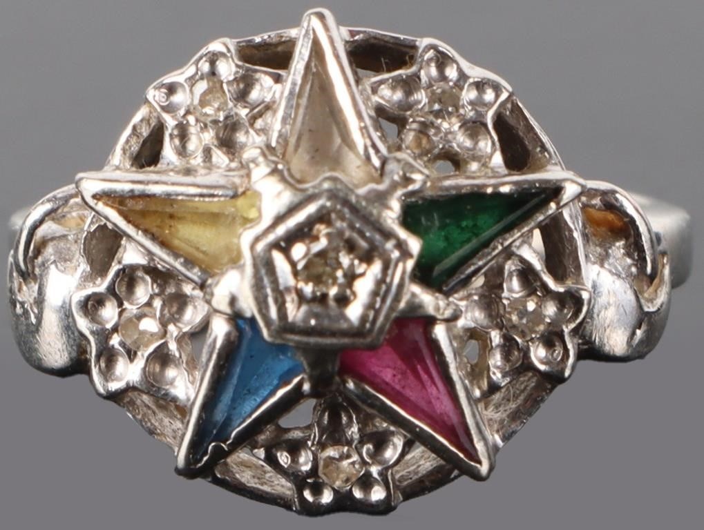 10K WHITE GOLD RING ORDER OF EASTERN STAR DIAMONDS: 10k white gold ladies ring decorated with the insignia of the Order of the Eastern Star. The colors in the pentagram are colored spinel and between the points and in the center of the pentagram are me