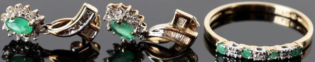 10K EMERALD & DIAMOND LADIES EARRING & RING SET: This set has a dainty emerald and diamond ladies band 4 emeralds and 3 diamonds. The earrings have channel cut diamonds in a Y shape with an oval emerald surrounded by a halo of diamonds hanging from 