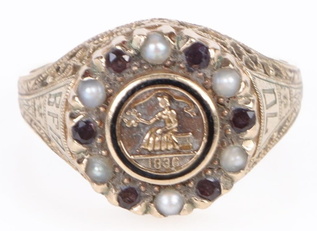 10K YELLOW GOLD 1846 GOLD COIN LADIES PEARL RING: 10k yellow gold 1846 gold coin ladies pearl and garnet ring. Stone Type: Assorted Weight: 4.0 Grams Size: US 4.5 Condition: Wear commensurate with age.