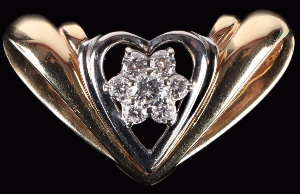 14K YELLOW/WHITE GOLD PENDANT VS D-COLOR DIAMONDS: 14K yellow/white gold ladies pendant. The outer area is yellow gold and the inner heart-shaped area is white gold.. The piece includes seven VS D-color diamonds, consisting of one 0.4ct round-cut