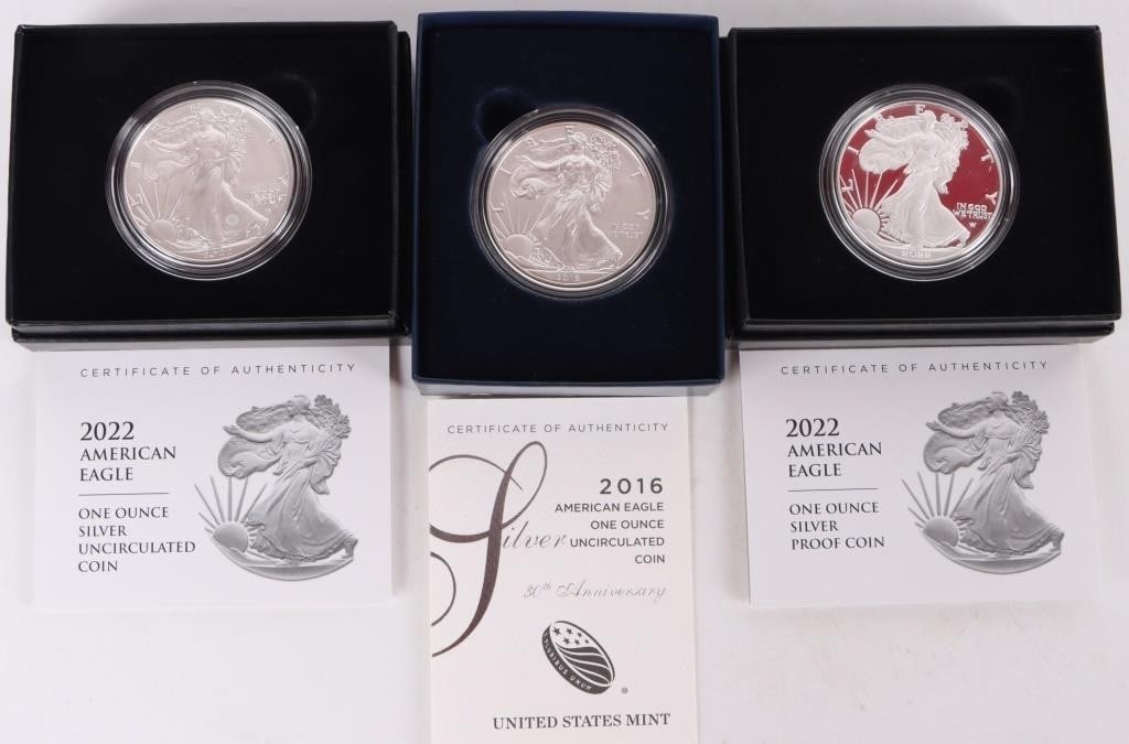 FINE SILVER AMERICAN EAGLES BOXED W/ COA - (3): Fine silver American Eagles boxed w/ COA to include two 2022 American Eagles and one 2016 American Eagle. Weight: 93.312 Grams Condition: Mint State uncirculated.