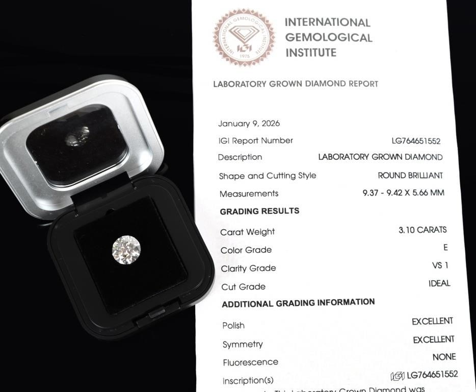 3.1CT VS 1 E COLOR ROUND DIAMOND W/ IGI REPORT: 3.1ct round-cut diamond with an IGI report. The report states that the piece possesses VS 1 clarity, E color, an Ideal cut, Excellent polish and symmetry, and no fluorescence. Stored in a plastic case