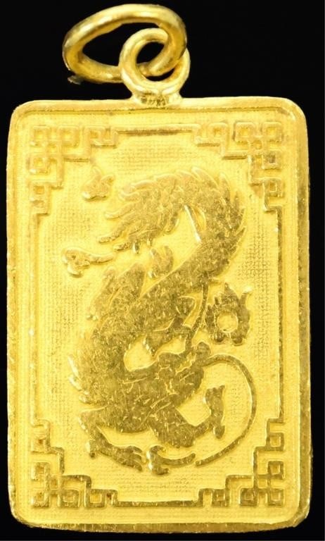 22K YELLOW GOLD LADIES CHINESE FU DRAGON PENDANT: 22k yellow gold ladies pendant. One side features the Chinese Fu (fortune/happiness) symbol and the other features an Asian dragon. Weight: 7.59 grams Size: 37 x 18.9 mm Condition: Worn from use, see 
