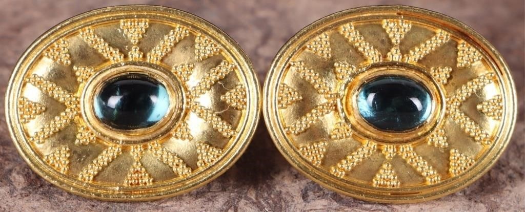 18K YELLOW GOLD MEDIEVAL REVIVAL EARRINGS W/ AQUA: 18k yellow gold ladies earrings moulded in a Medieval revival style. Each features an oval-cut cabochon aquamarine gemstone. Stone Type: Aquamarine Weight: 9.83 grams Size: 22.25 X 17mm Condition: See