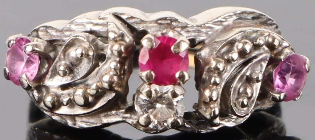 14K WHITE GOLD NATURAL DIAMOND SAPPHIRE RUBY RING: 14K white gold natural diamond sapphire ruby ladies ring. Gemstones to include two 0.07ct round cut pink sapphire, one 0.07ct round cut pink ruby, and one 0.07ct round cut natural diamond. Diamond ver