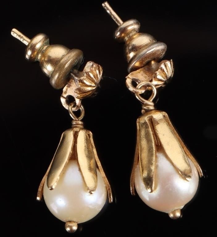 14K YELLOW GOLD PEARL LADIES EARRINGS: 14K yellow gold pearl ladies earrings. Gemstones to include one 7.16mm white pearl per each earring. Stone Type: Pearl Weight: 3.23 Grams Size: 0.875" Condition: Little wear, see images for details.