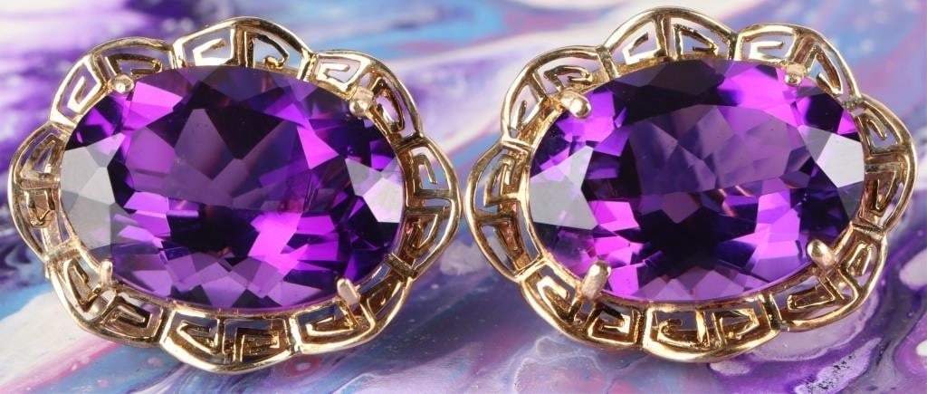 14K YELLOW GOLD 17.96MM AMETHYST LADIES EARRINGS: 14K yellow gold 17.96mm amethyst ladies earrings. Gemstones to include one 17.96mm X 13.01mm oval cut amethyst per each earring. Stone Type: Amethyst Weight: 9.45 Grams Size: 1.00" Condition: Little t