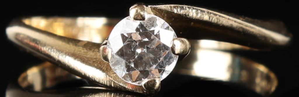 NATURAL DIAMOND 14K YELLOW GOLD ELEVATED RING: 14K yellow gold ladies ring featuring a 0.33CT round cut natural diamond set in a graceful tapered twist setting. Stone Type: Diamond Weight: 2.23 Grams Size: 7.0 U.S Condition: Very fine.