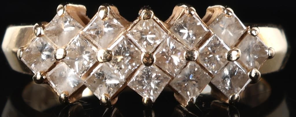 1.6 CTW DIAMONDS 14K YELLOW GOLD LADIES RING: 14k yellow gold ladies ring with sixteen 0.1ct square-cut diamonds diagonally set across the face (1.6ctw). Stone Type: Diamond Weight: 3.76 grams Size: US 7 Condition: See pictures.