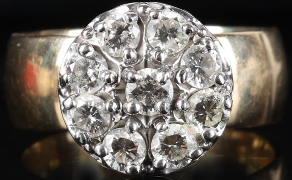 14K YELLOW GOLD NATURAL DIAMOND LADIES RING: 14K yellow gold ladies ring featuring nine 0.15CT round cut natural diamonds in a high solitare cluster setting Stone Type: Diamond Weight: 9.85 Grams Size: 8.0 U.S Condition: See images
