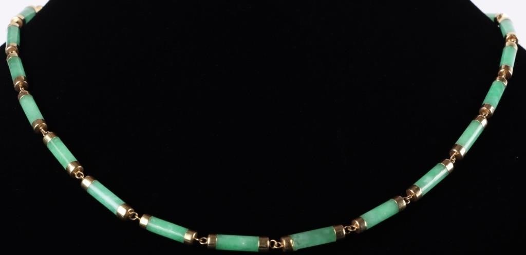 14K YELLOW GOLD IMPERIAL JADE LADIES NECKLACE: 14K yellow gold imperial jade ladies necklace. Gemstones to include twenty-four 10.88mm cylindrical cabochon imperial jade. Stone Type: Jade Weight: 16.92 Grams Size: 18.50" Condition: Little wear, se