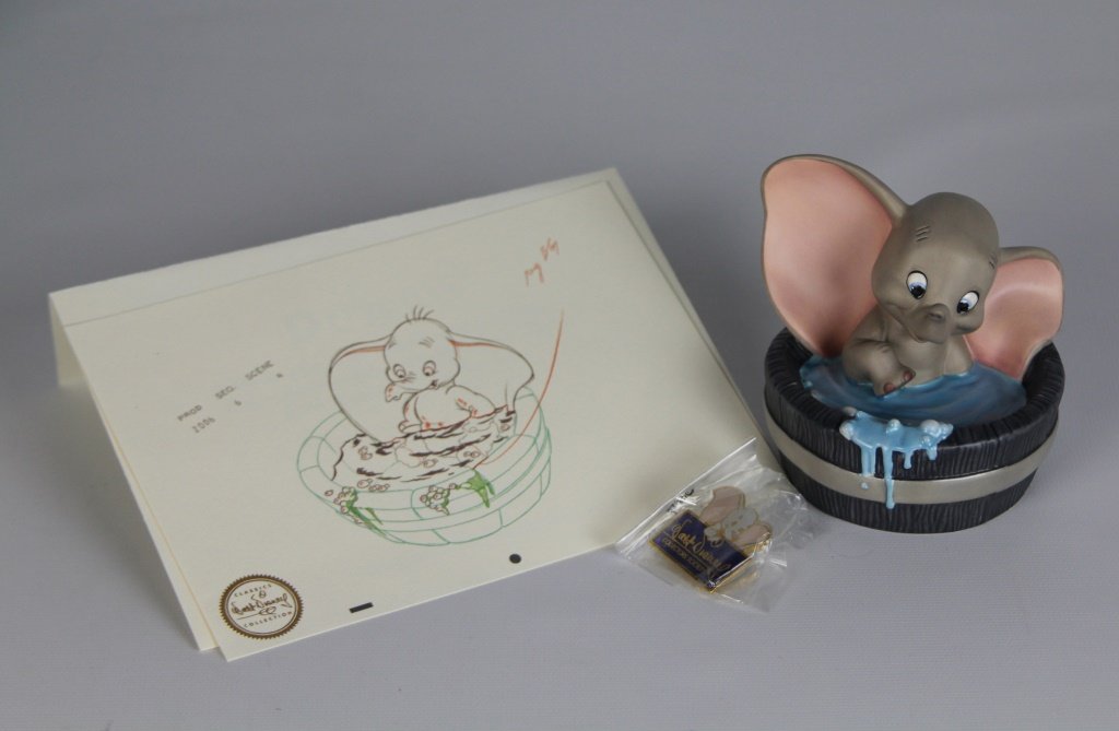 WDCC DUMBO "SIMPLY ADORABLE" W/ PIN: WDCC DUMBO "SIMPLY ADORABLE" W/ PIN Walt Disney Classics Collection. With pin and fine art print. Shipping / Pickup: We Can Ship This Item Lot Location: #3 - Off Cap. Cir. NE