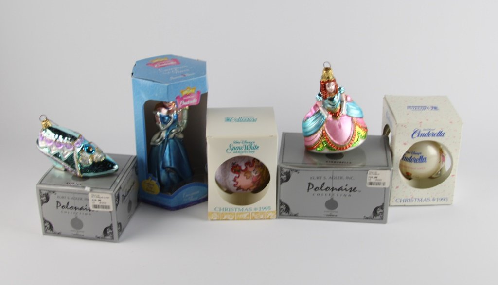 CINDERELLA EUROPEAN STYLE GLASS ORNAMENTS: CINDERELLA EUROPEAN STYLE GLASS ORNAMENTS Kurt Adler Polonaise Collection Cinderella & Slipper, Cinderella & Prince from Disney, and two ball ornaments - 1993 - Cinderella and 1995 - Snow White. Shipp