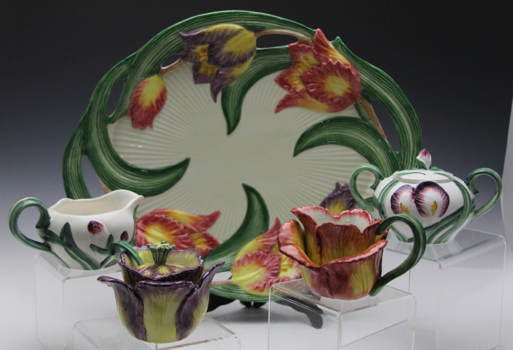 FITZ & FLOYD LOT: FITZ & FLOYD LOT 17" platter, Iris creamer and sugar, Tulip pitcher, Iris sugar. Platter has achip to base rim, the rest are very good. Shipping / Pickup: Buyer Pick Up, 3rd Party Lot Location: #2 - O
