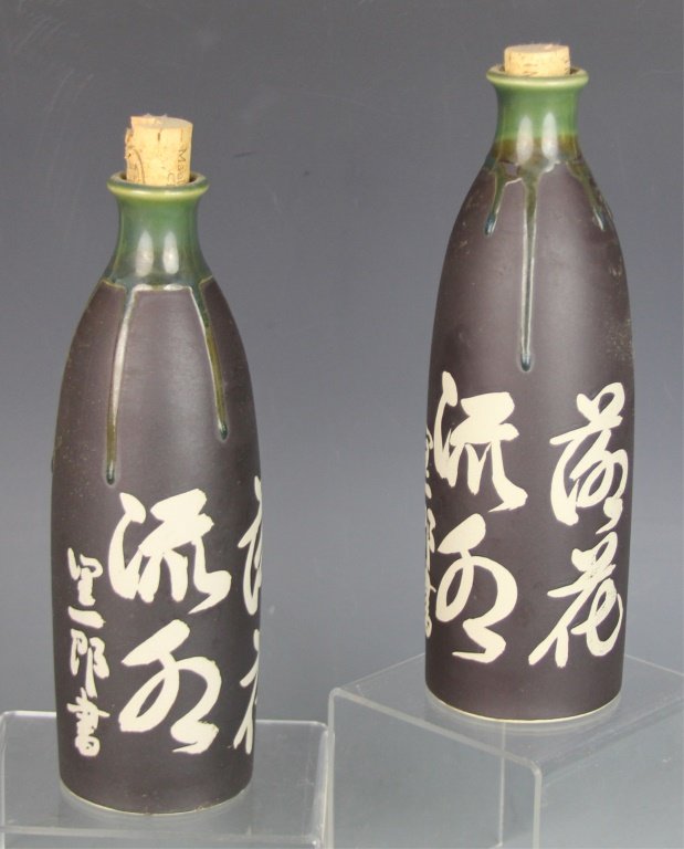 2 JAPANESE SAKE BOTTLES: 2 JAPANESE SAKE BOTTLES Size: 9" Shipping / Pickup: We Can Ship This Item Lot Location: #1 - Millstone Plant. Rd.