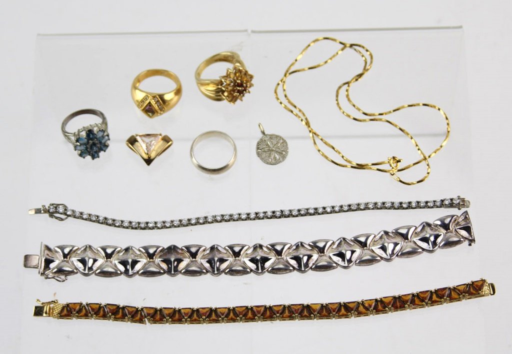(10) PIECES LADIES STERLING SILVER JEWELRY: (10) PIECES LADIES STERLING SILVER JEWELRY Lot of ten ladies sterling silver jewelry pieces. Includes bracelets, chain, rings, and pendants. Some are studded with rhinestones. All pieces are marked. W
