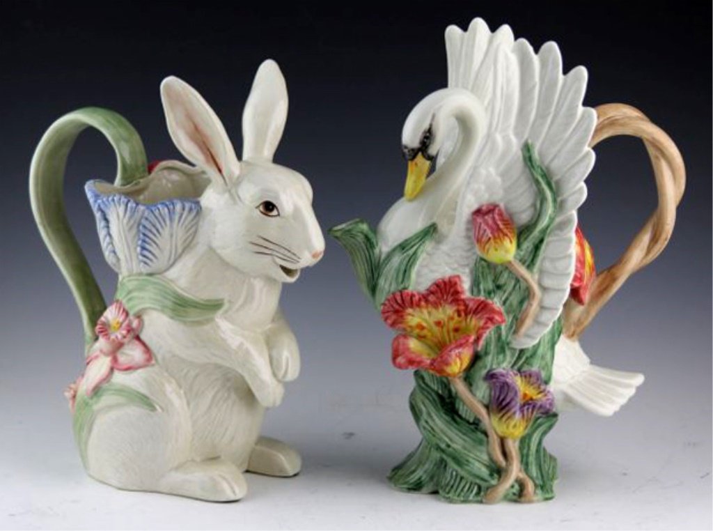 (2) FITZ AND FLOYD SWAN & RABBIT PITCHERS: (2) FITZ AND FLOYD SWAN & RABBIT PITCHERS Lot of two Fitz and Floyd porcelain pitchers, hallmarked on underside. Size: Swan; 12", Rabbit; 10" Shipping / Pickup: We Can Ship This Item Lot Location: #1