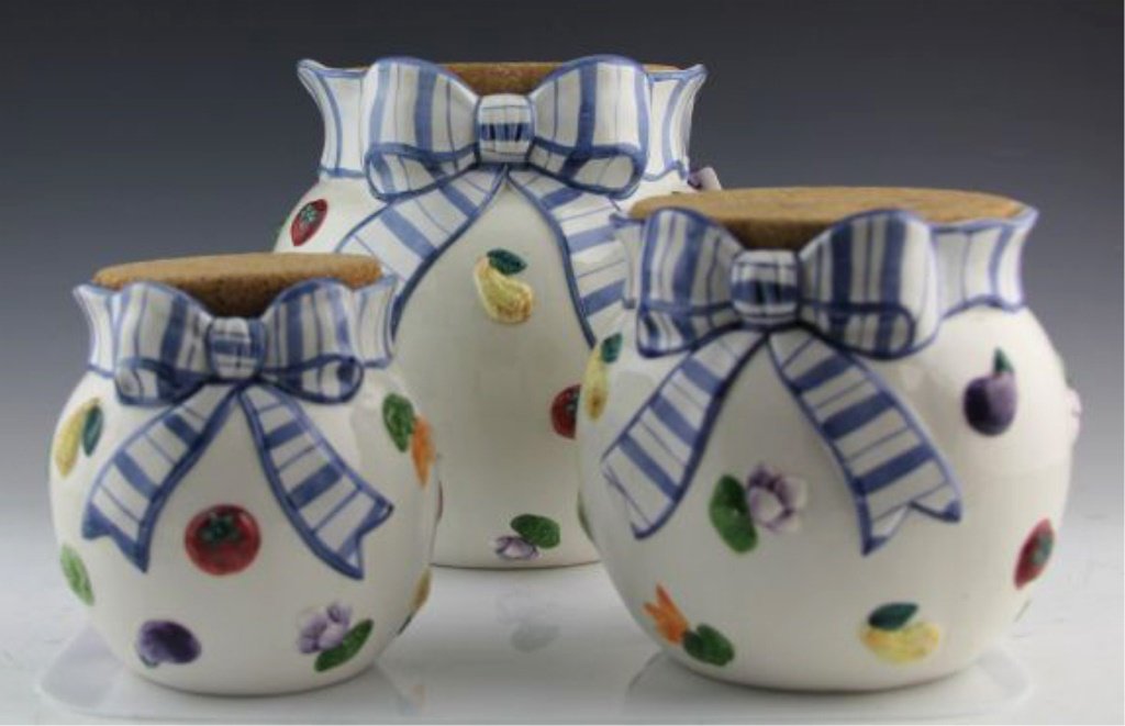 (3) FITZ & FLOYLD PETITS VEGS GRADUATED CANISTERS: (3) FITZ & FLOYLD PETITS VEGS GRADUATED CANISTERS Three graduated canisters from Fitz and Floyd Petits Vegs collection, with cork lids. Size: 5", 6", 7.5" Shipping / Pickup: We Can Ship This Item Lot