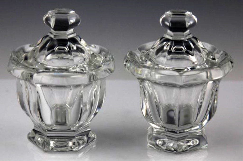 (2) BACCARAT CRYSTAL CONDIMENT JARS: (2) BACCARAT CRYSTAL CONDIMENT JARS Lot of two Baccarat crystal condiment jars with lids, marked on underside. Size: 4.25" Shipping / Pickup: We Can Ship This Item Lot Location: #1 - Cap. Cir. NE