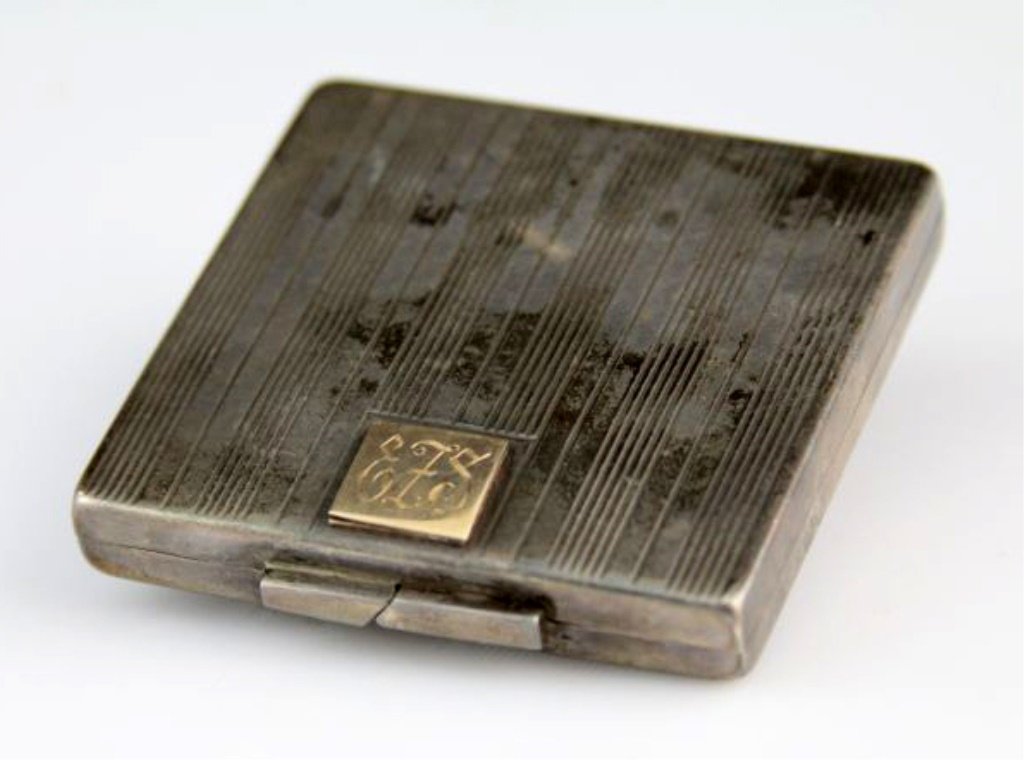 STERLING SILVER COMPACT: STERLING SILVER COMPACT Monogrammed "EFS". Weight: 78.9 g Size: 2.5 X 2.5" Lot Location: #1 - Cap. Cir. NE