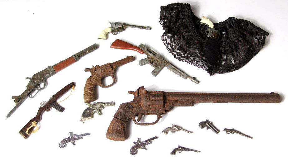 LOT OF TOY AND CAP GUNS: LOT OF TOY AND CAP GUNS 14 pieces, some antique Shipping / Pickup: We Can Ship This Item Lot Location: #2 - Calvary, GA