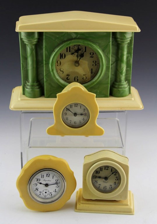 (4) VINTAGE CELLULOID CLOCKS (1 of 4)