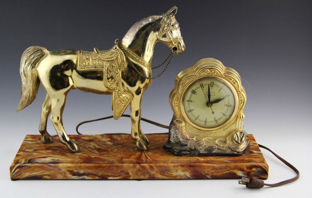 UNITED SELF STARTING FIGURAL HORSE CLOCK ELECTRIC