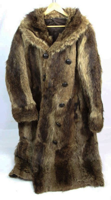 RACCOON FUR FULL LENGTH COAT: RACCOON FUR FULL LENGTH COAT 53" nape to tail, ~29" arm, ~22" at shoulders. Shipping / Pickup: We Can Ship This Item Lot Location: #1 - Manor's Gallery
