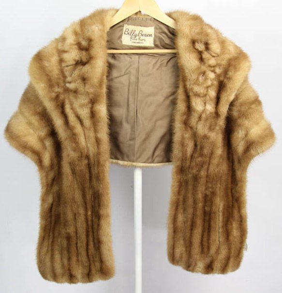 AUTUMN HAZE MINK CAPE PONCHO: AUTUMN HAZE MINK CAPE PONCHO Autumn Haze mink from mature male pelts, Silk lining, Furrier: Billy Besen Rich let out blonde color, with pockets, Monogrammed Size: 6-10 Shipping / Pickup: We Can Ship T