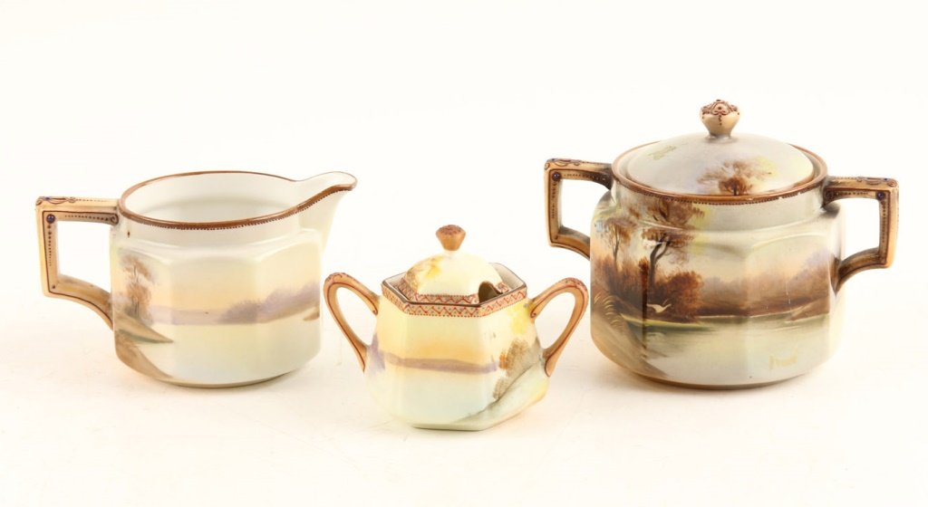 LOT OF THREE PIECES OF NORITAKE PORCELAIN: LOT OF THREE PIECES OF NORITAKE PORCELAIN Meadow pattern. Includes creamer, sugar, and condiment jar. Shipping / Pickup: Buyer Pick Up, 3rd Party Lot Location: #1 - Manor's Gallery