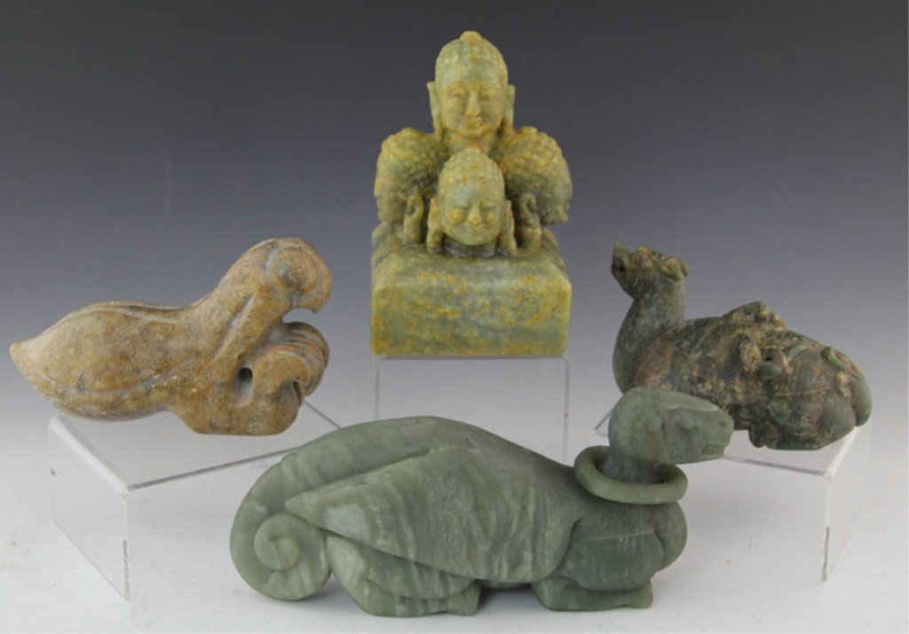LOT OF 4 SOFTSTONE CARVINGS: LOT OF 4 SOFTSTONE CARVINGS Four softstone carvings. Includes: seal with figural Buddha heads (6.5" height), praying mantis (7" length), turtle dragon (6" length), and a creature (9" length). Shipping