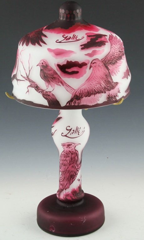 REPRODUCTION GALLE BIRD MOTIF CAMEO GLASS LAMP: REPRODUCTION GALLE BIRD MOTIF CAMEO GLASS LAMP With white and magenta base colors. Size: 14.5" Condition: Very good. Does not include any electrical components.