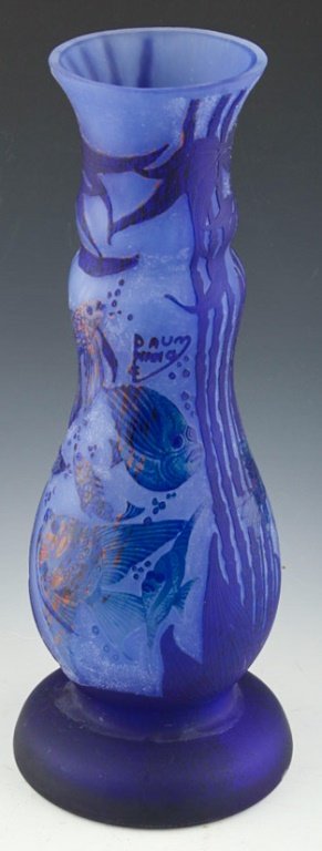 REPRODUCTION DAUM FISH MOTIF CAMEO GLASS VASE: REPRODUCTION DAUM FISH MOTIF CAMEO GLASS VASE With multicolor striations through the glass and a blue base color. Size: 13.75" Condition: Very good.