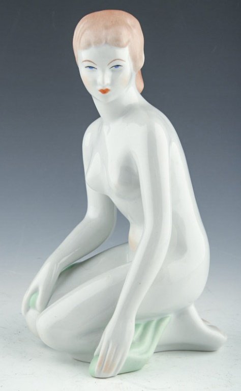 AQUINCUM BUDAPEST PORCELAIN KNEELING WOMAN STATUE: AQUINCUM BUDAPEST PORCELAIN KNEELING WOMAN STATUE Size: 9" Condition: Very good Shipping / Pickup: Buyer Pick Up, 3rd Party Lot Location: #1 - Manor's Gallery