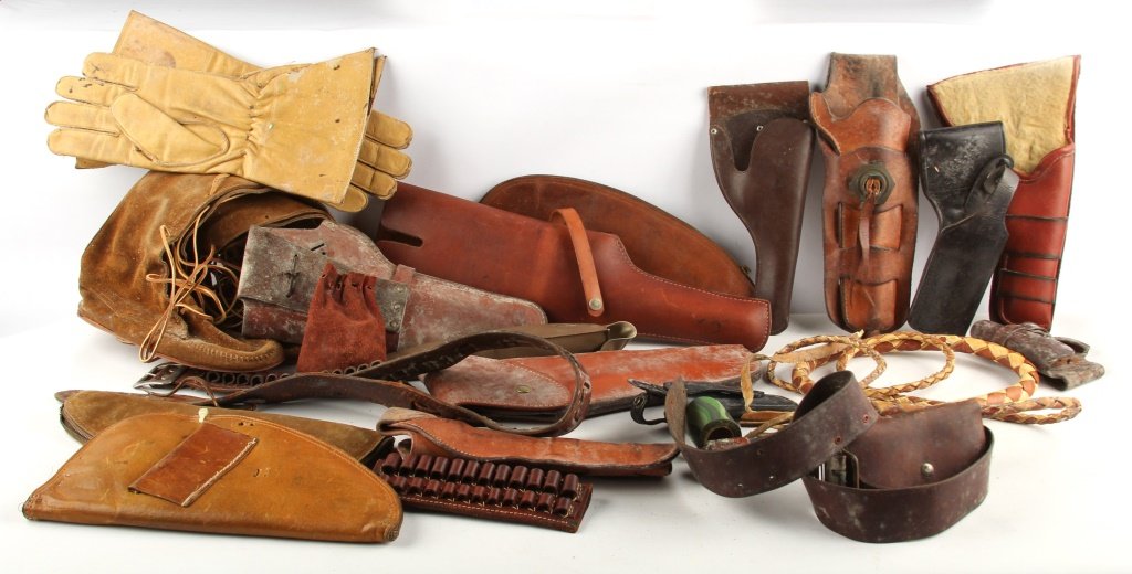 LOT OF LEATHER - GLOVES, HOLSTERS, SHOES & MORE: LOT OF LEATHER - GLOVES, HOLSTERS, SHOES & MORE Contains gloves, gun holsters and shoes Condition: Fair, some pieces exhibit age wear and mold. Shipping / Pickup: We Can Ship This Item Lot Location: #