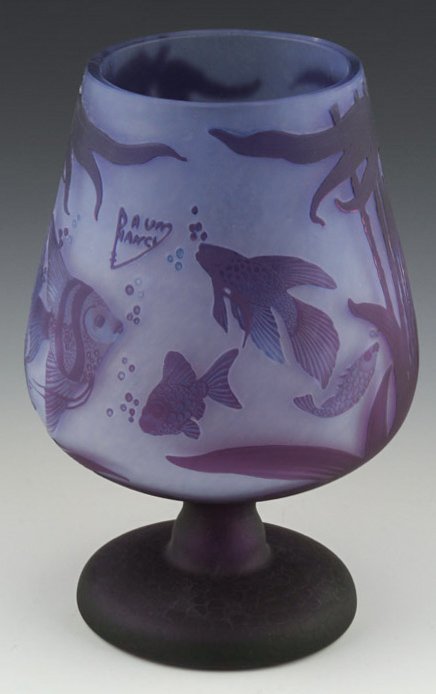 REPRODUCTION DAUM CAMEO GLASS FISH MOTIF VASE: REPRODUCTION DAUM CAMEO GLASS FISH MOTIF VASE Reproduction Daum cameo glass fish motif vase with blue and purple. Size: 10.75" Shipping / Pickup: Buyer Pick Up, 3rd Party Lot Location: #1 - Manor's Ga