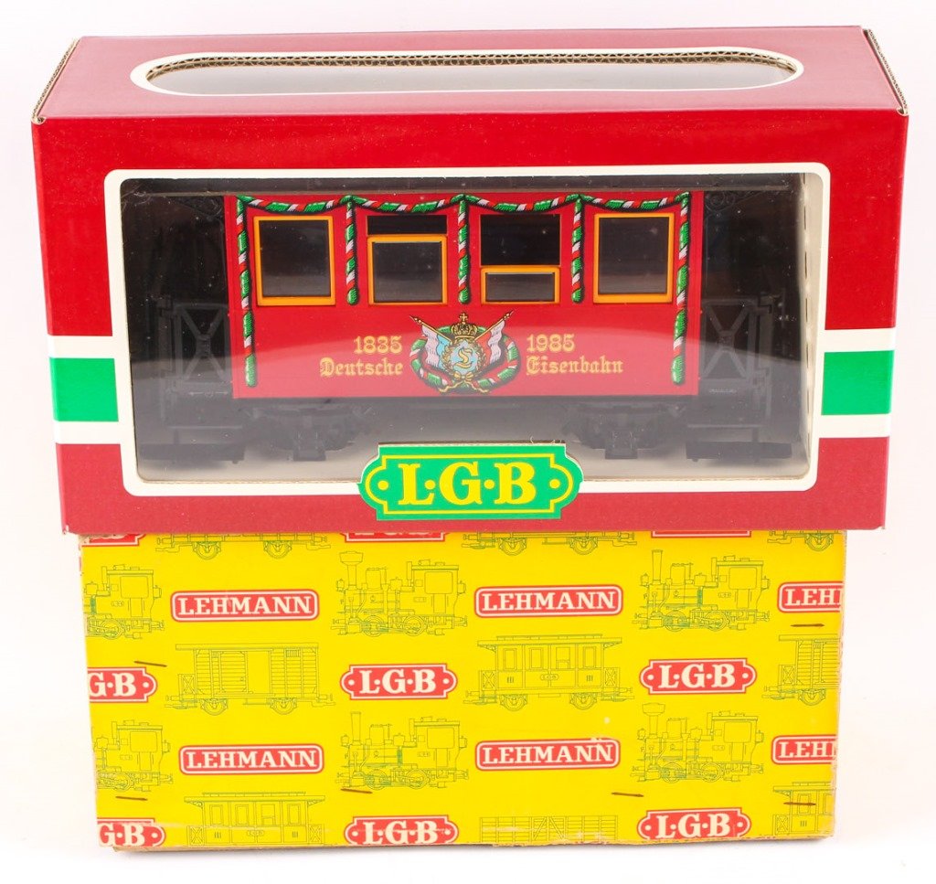 LOT OF TWO LGB TRAINS: WAPPENWAGEN & 3RD CLASS CAR: LOT OF TWO LGB TRAINS: WAPPENWAGEN & 3RD CLASS CAR Serial numbers 3150 and 3040. Includes original boxes. Shipping / Pickup: We Can Ship This Item Lot Location: #1 - Manor's Gallery