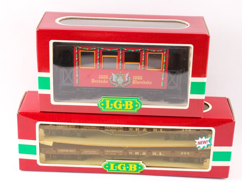 TWO LGB TRAINS: SR & LR FLAT CAR 150TH ANNIVERSARY: TWO LGB TRAINS: SR & LR FLAT CAR 150TH ANNIVERSARY Serial numbers 3150 and 41600. Includes original boxes. Shipping / Pickup: We Can Ship This Item Lot Location: #1 - Manor's Gallery