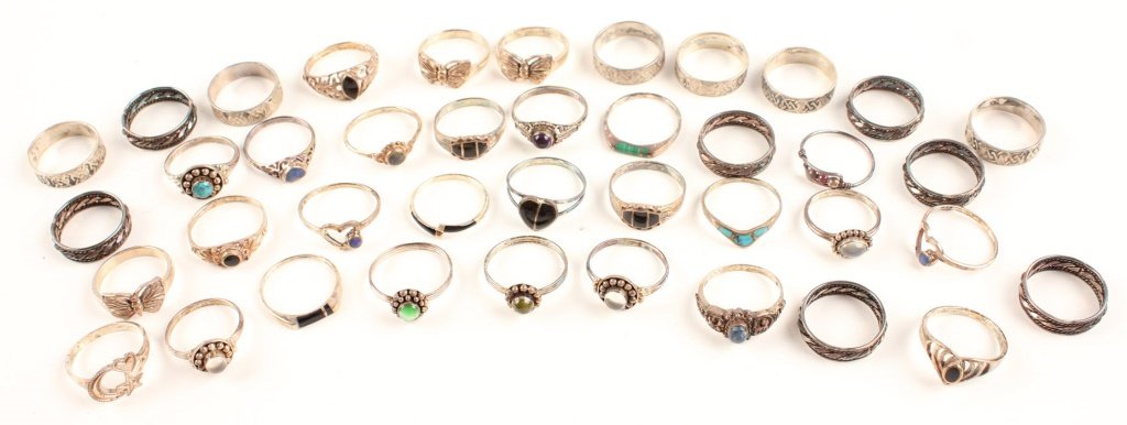 40 STERLING SILVER RINGS SODALITE AND MORE: 40 STERLING SILVER RINGS SODALITE AND MORE Most rings are set with glass and sodalite. Weight: 86.8g total Shipping / Pickup: We Can Ship This Item Lot Location: #1 - Manor's Gallery